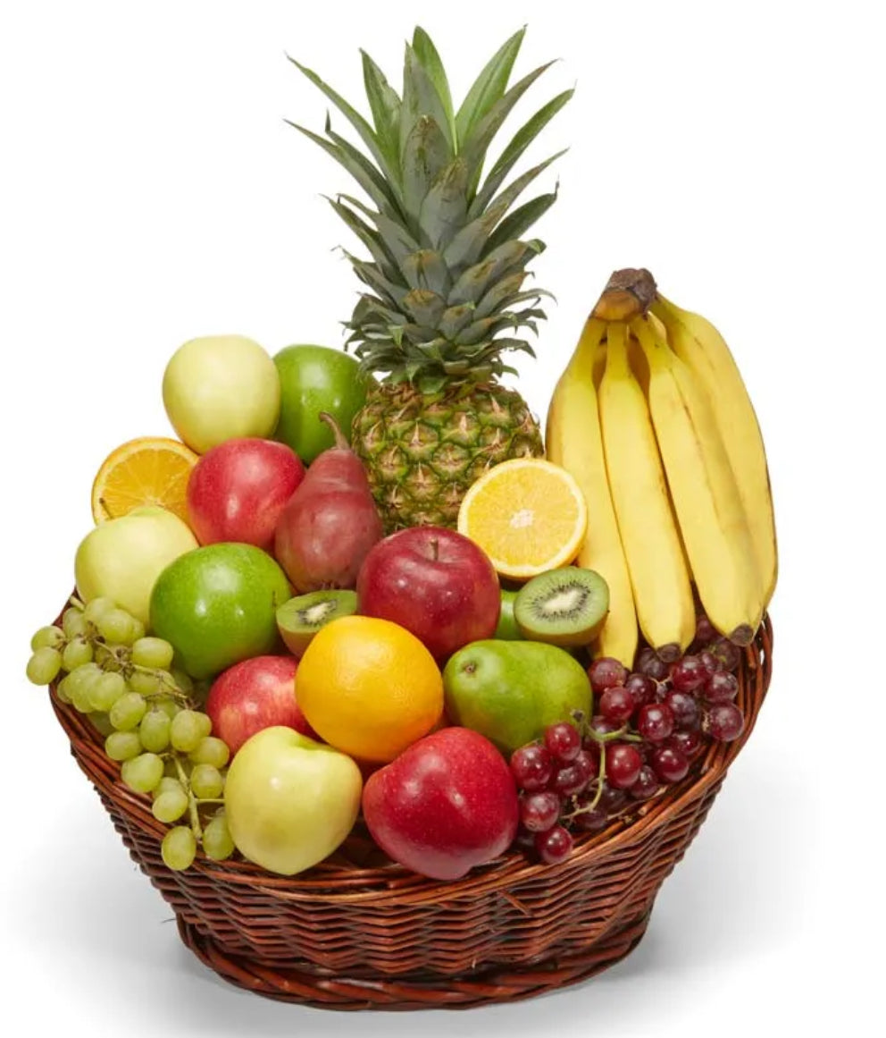 Fruit basket with a variety of fruits including apples, bananas, and a pineapple on a white background.
