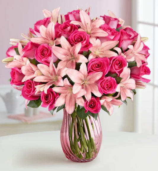 Elegant pink and white bouquet with roses, lilies, and carnations in a glass vase – Blushing Beauty Bouquet by 1800 Blooms Bronx NY