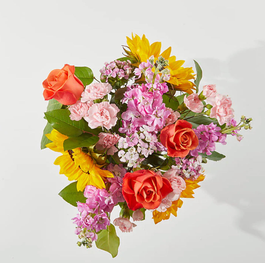 Bright birthday bouquet with sunflowers, yellow roses, and daisies – Sunshine & Charm Bouquet by 1800 Blooms Bronx NY